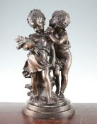 After Augustus Moreau. A patinated bronze group 'Whispering Children', 17in. After Augustus