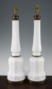 A decorative pair of white opaque glass facet cut mallet shaped table lamps, 2ft 2in. A decorative