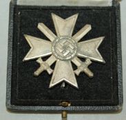 A German Third Reich 1939 iron cross, A German Third Reich 1939 iron cross, marked for 65 For