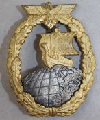 A German Third Reich Auxiliary cruiser badge, A German Third Reich Auxiliary cruiser badge, with