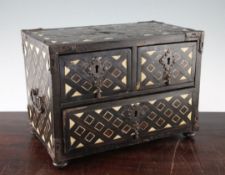 An 18th century Indo-Portuguese ebony, tortoiseshell and bone inlaid table top chest, 14.5in. An