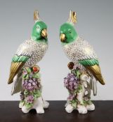 A pair of Samson porcelain figures of cockatoos, early 20th century, 26cm and 26.5cm. A pair of