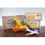 A Dinky Supertoys 998 Bristol Britannia airliner, a Dinky Supertoys 972 lorry mounted crane, a Dinky