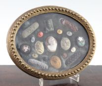 A collection of Italian Grand Tour lava, cameo and pietra dura roundels and plaques, framed and