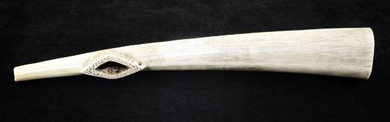 A 19th century or earlier African ivory oliphant, of plain form with diamond shaped mouth piece,