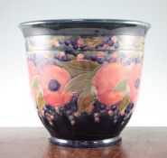 A large William Moorcroft pomegranate pattern jardiniere, dated 1919, impressed marks Moorcroft