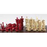 A late 19th / early 20th century Cantonese carved ivory chess set, complete with thirty two red