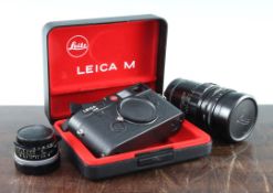A Leica M6 black 1665516, with black plastic case and original cardboard box, together with a