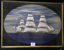 A 19th century woolwork panel, depicting a three mast clipper at sail, in an ebonised frame, overall