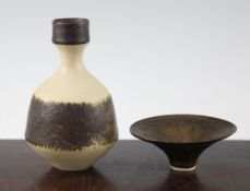 Dame Lucie Rie D.B.E. (1902-1995). A porcelain bottle vase and a small flaring bowl, the bottle vase