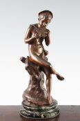 A late 19th / early 20th century French patinated bronze model figure of Pan, signed Laouette, on