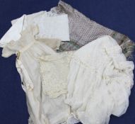 A collection of Georgian textiles, including a lace bed cover with pillow case and panel to match,