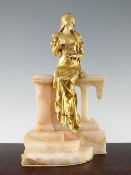 Dominique Alonzo (French, fl.1910-1930)., A gilt bronze and ivory figure, 'The Jewel Box',