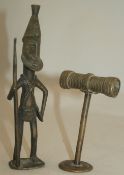 A Benin bronze figure of a warrior, 7in., and a T shaped stand, 4.5in.