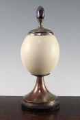 Anthony Redmile. An ostrich egg vase and cover, with plated mounts and blue john acorn finial,