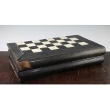 An Anglo Indian horn and ivory inlaid folding chess and backgammon board, modelled as two books,