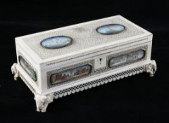 A 19th century Indian pierced ivory rectangular shape casket, mounted with painted miniatures,