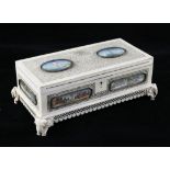 A 19th century Indian pierced ivory rectangular shape casket, mounted with painted miniatures,