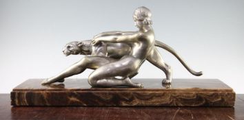 Alexandre Ouline (France, fl.1918-1940). An Art Deco silvered bronze 'Girl with a Panther', modelled