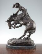 After Frederic Remington. 'The Rattle Snake', a large 20th century patinated figure of a cowboy on