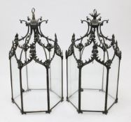 A pair of late 19th century hexagonal hall lanterns, with glazed arched shape panels, 32 x 17.5in.