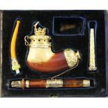 A Victorian cased Meerschaum pipe smoking set, with 18ct gold mounts marked for RD, London 1853,