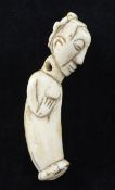 A 19th century African Luba ivory pendant carving, of female form with cross-shaped coiffeur, 4.