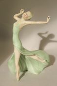 A rare Wade Art Deco underglaze porcelain figure of Joy, c.1939, hand inscribed blue Wade England