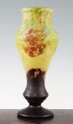 A Daum cameo and vitrified glass vase, c.1910, overlaid and acid etched with trailing branches of