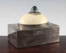 Anthony Redmile. A rectangular plated cigarette box, the lid mounted with a domed ostrich egg with