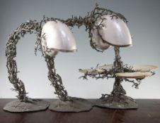 A pair of Maitland & Smith nautilus table lamps, modelled with seashells, starfish and coral, with