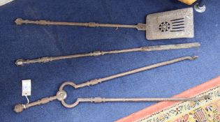 A set of three Regency steel fire irons, with poker, shovel and tongs, each with facetted knop