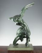 R. Pollin (French, 20th century). A green patinated bronze study of a parrot and cockatoo, on a