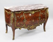 A Louis XV style kingwood floral inlaid and ormolu mounted bombe shaped commode, with serpentine