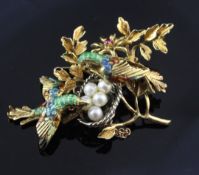 A 1960's Italian 18ct gold, ruby, cultured pearl and enamel brooch, modelled as two birds with