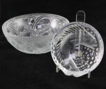 A Lalique 'Pinsons' pattern bowl and a 'Concarneau' carp decorated ashtray, post-war, both in