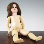 A Jumeau bisque head Bebe doll, with fixed brown eyes, bisque head marked Depose, with jointed