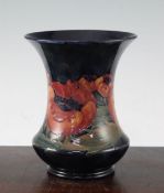 A William Moorcroft Big Poppy pattern waisted baluster vase, c.1924, with mottled cobalt blue