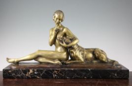 A French Art Deco bronze of a seated nude and dog, signed L.Riché, on rectangular marble plinth