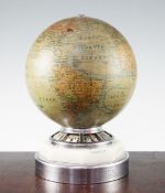 A Jaeger Le Coutre globe timepiece, surmounted with a terrestrial globe by J. Forrest of Paris,