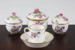 A Sevres sucrier and cover and a similar coffee can and saucer, c.1766, each painted with flower