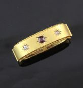 A late Victorian 15ct gold, ruby and diamond set scarf clip, in original box, gross 7.6 grams,