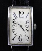 A gentleman's stylish 1930's silver Longines manual wind wrist watch, with large rectangular