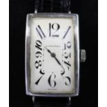 A gentleman's stylish 1930's silver Longines manual wind wrist watch, with large rectangular