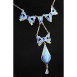 A mid 20th century? silver and guilloche enamel pendant drop necklace, with three ribbon bow