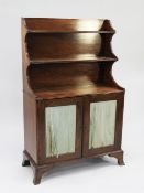 A 19th century mahogany chiffonier, the top fitted with two shelves, with reeded shaped sides
