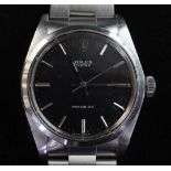 A gentleman's late 1960's stainless steel Rolex Precision manual wind wrist watch, with black dial