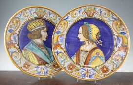 A pair of Deruta maiolica portrait chargers, 20th century, each painted with a portrait of a