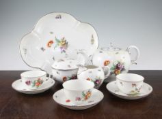 A Nymphenburg forty piece tea set, early 20th century, each piece painted with flower bouquets
