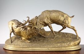 After P J Mene. A large bronze group modelled as two fighting stags, on an oval naturalistic base,